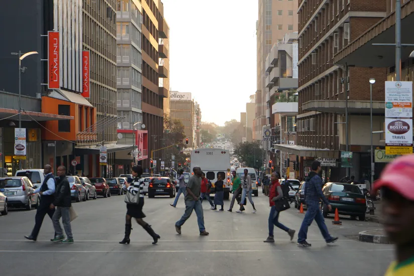 People crossing a street in Johannesburg, South Africa